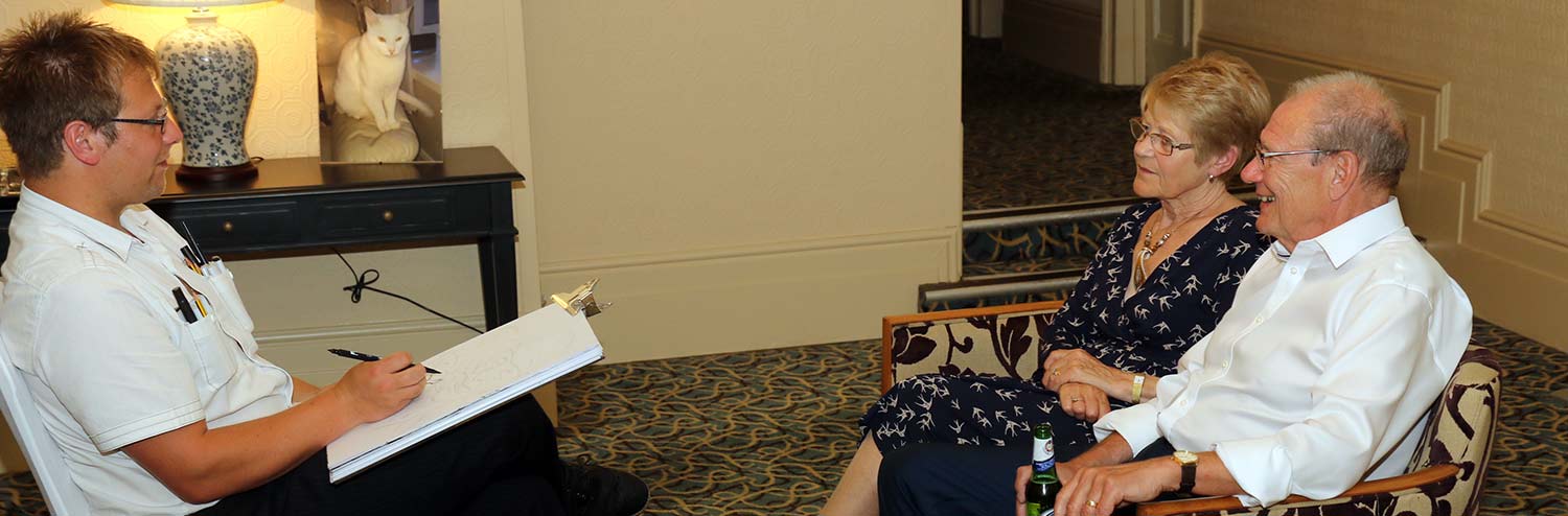 older married pair getting a caricature