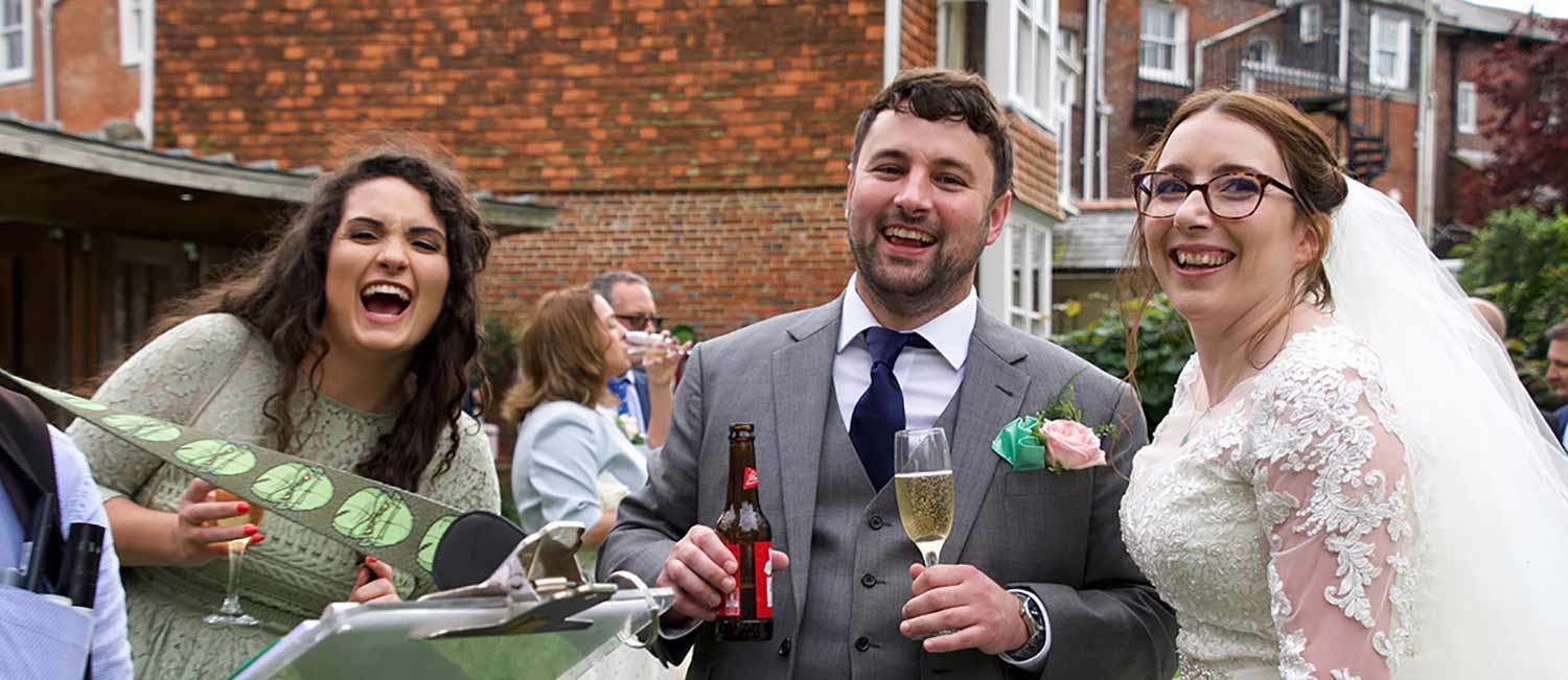 everyone laughing at the caricature